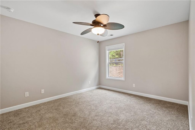 unfurnished room featuring carpet and ceiling fan