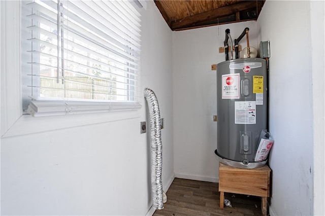 utility room featuring water heater