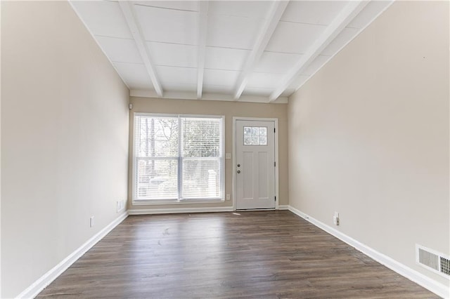 entryway with dark wood finished floors, visible vents, beamed ceiling, and baseboards