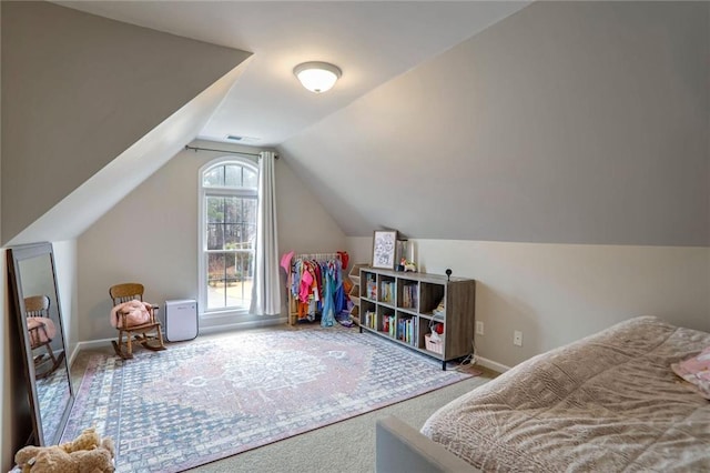 interior space featuring lofted ceiling and carpet floors