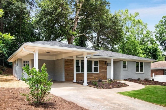 view of front of property with a carport