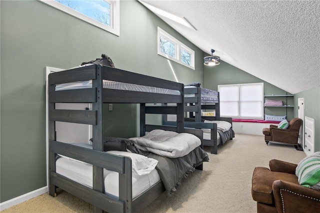 bedroom featuring carpet floors, a textured ceiling, and vaulted ceiling