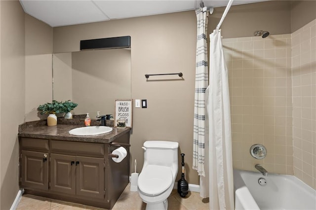 full bathroom with shower / bath combo, baseboards, toilet, tile patterned flooring, and vanity