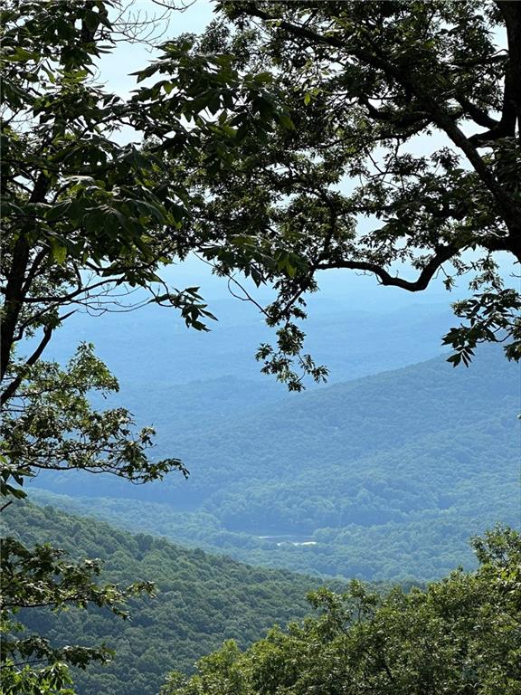 view of mountain feature with a water view