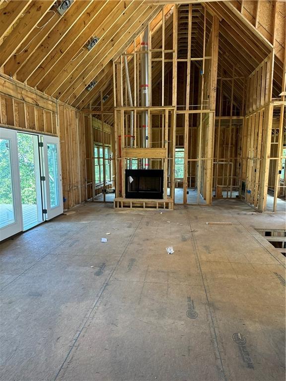 misc room featuring high vaulted ceiling