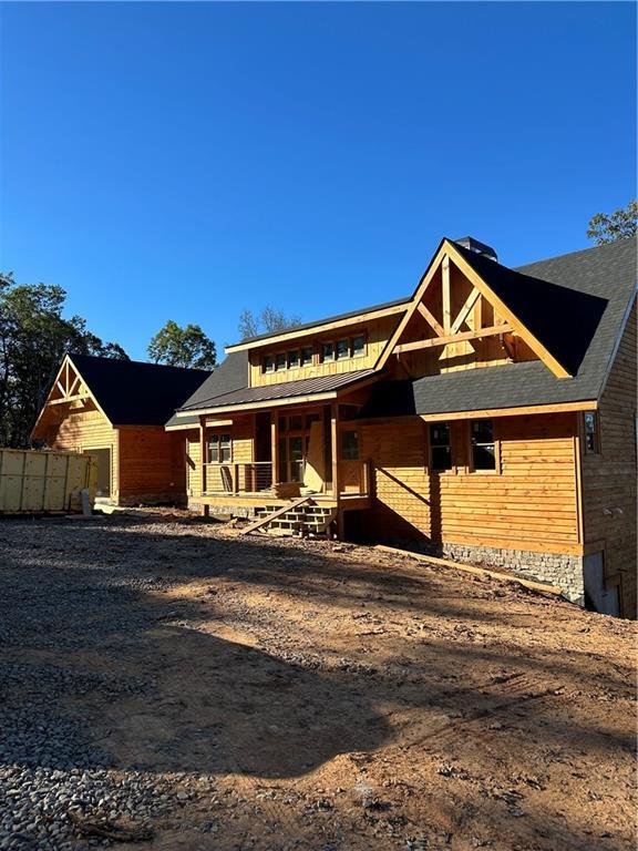 view of front of property featuring covered porch