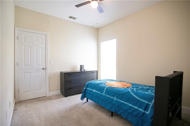 401 Oscar Way, Dallas, GA 30132 - carpeted bedroom with baseboards and a ceiling fan