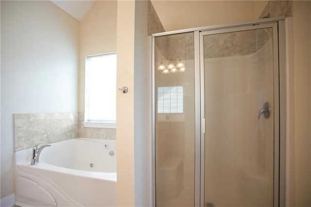 401 Oscar Way, Dallas, GA 30132 - bathroom with a shower stall, a tub with jets, and lofted ceiling