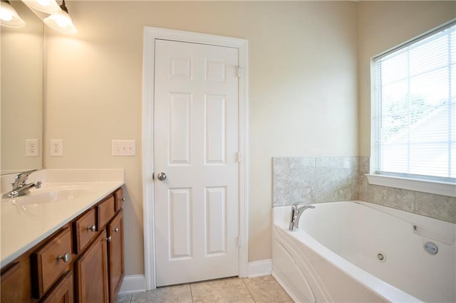 401 Oscar Way, Dallas, GA 30132 - bathroom with vanity, a whirlpool tub, and tile patterned floors