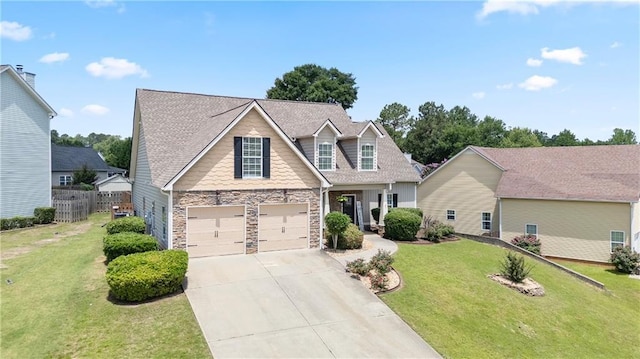 401 Oscar Way, Dallas, GA 30132 - view of front of home featuring driveway, stone siding, and a garage
