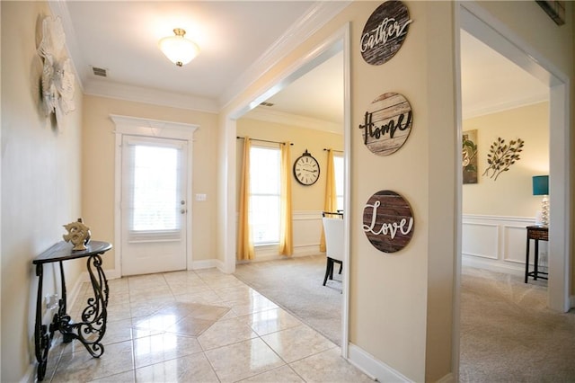 401 Oscar Way, Dallas, GA 30132 - entryway with light colored carpet, crown molding, and light tile patterned flooring