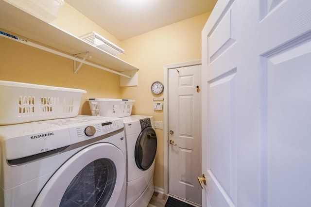 laundry area with washer and dryer and laundry area