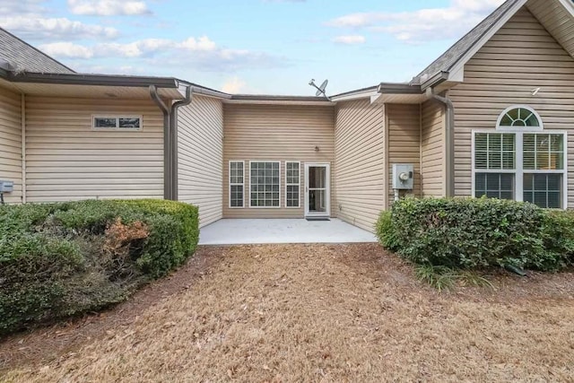 rear view of property with a patio area