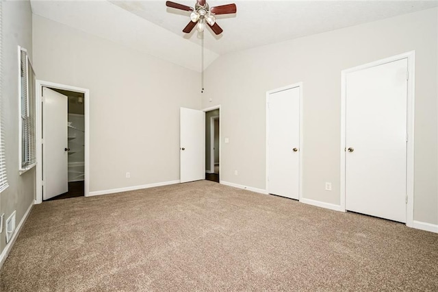 6194 Golden Meadow Ct, Riverdale, GA 30296 - unfurnished bedroom featuring carpet floors, vaulted ceiling, and ensuite bathroom