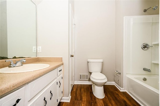 6194 Golden Meadow Ct, Riverdale, GA 30296 - full bathroom with vanity, wood finished floors, and tub / shower combination