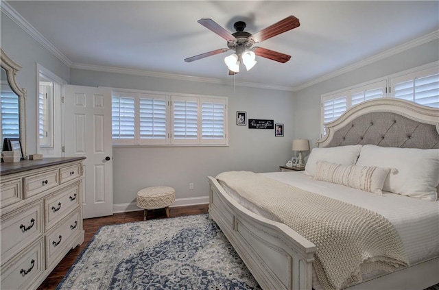 bedroom with a ceiling fan, baseboards, dark wood finished floors, and ornamental molding