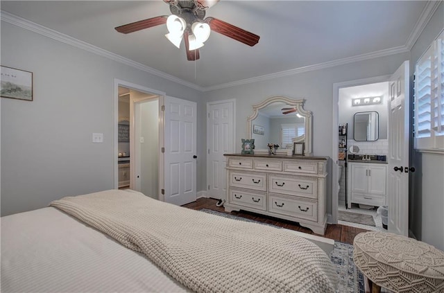bedroom with ceiling fan, ornamental molding, wood finished floors, and ensuite bath