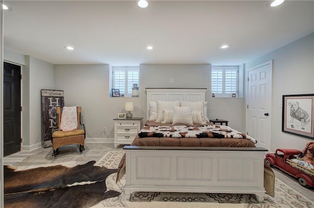 bedroom with recessed lighting and baseboards
