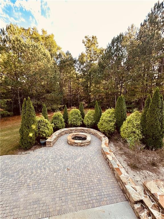 exterior space with a fire pit