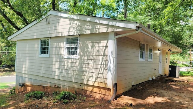 view of property exterior with cooling unit