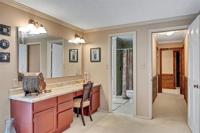 bathroom featuring crown molding, vanity, toilet, and a shower with shower curtain