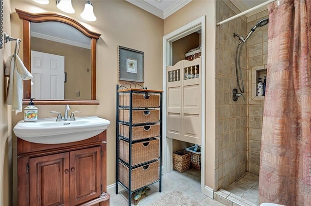 bathroom with ornamental molding, vanity, and walk in shower