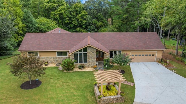 ranch-style house with a garage and a front yard