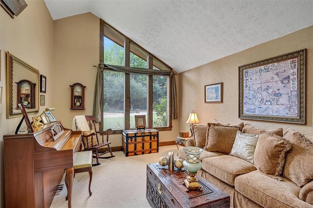 living room featuring a textured ceiling, carpet flooring, and high vaulted ceiling