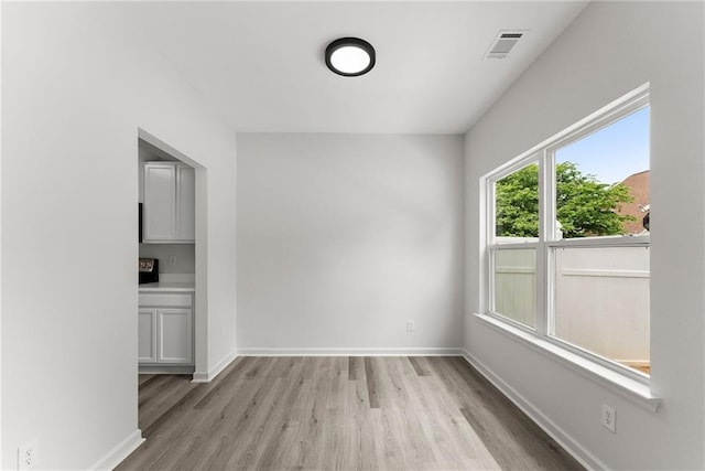 124 Oakmont Dr, Dawsonville, GA 30534 - unfurnished room featuring light wood-style floors and baseboards