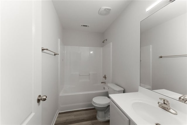 124 Oakmont Dr, Dawsonville, GA 30534 - full bath with wood finished floors, toilet, vanity, and shower / bathtub combination