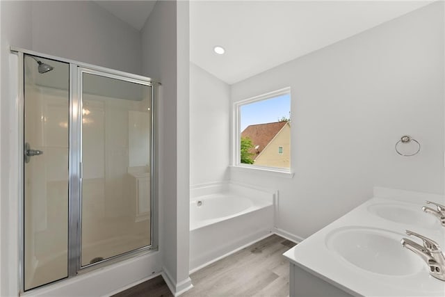 124 Oakmont Dr, Dawsonville, GA 30534 - bathroom featuring wood finished floors, a shower stall, a garden tub, and baseboards
