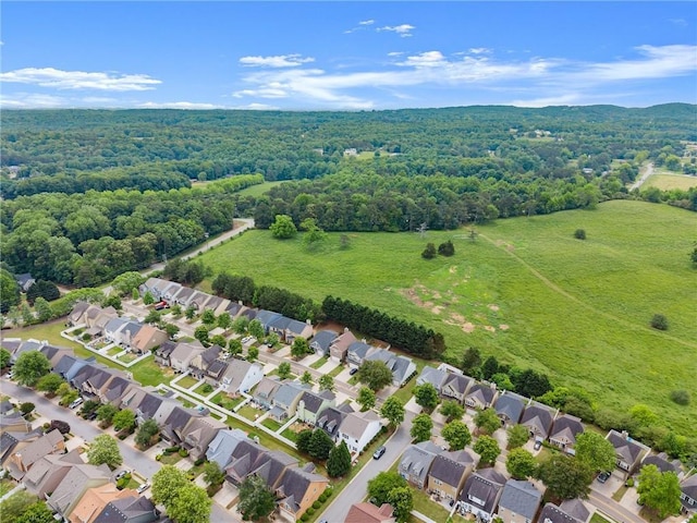 124 Oakmont Dr, Dawsonville, GA 30534 - aerial perspective of suburban area featuring a heavily wooded area