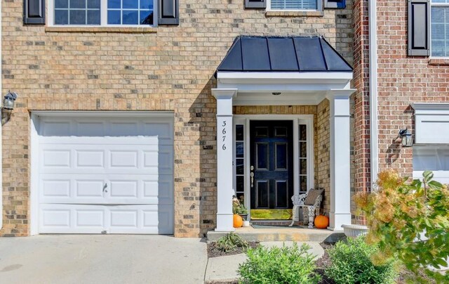 entryway with hardwood / wood-style floors