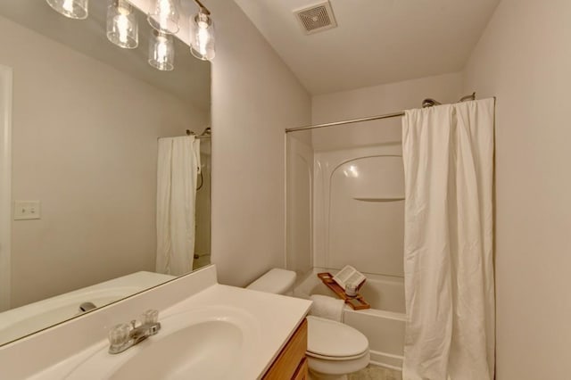 full bathroom featuring shower / bath combination with curtain, vanity, and toilet