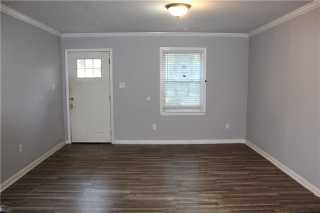 entryway with a healthy amount of sunlight, crown molding, and dark wood-type flooring