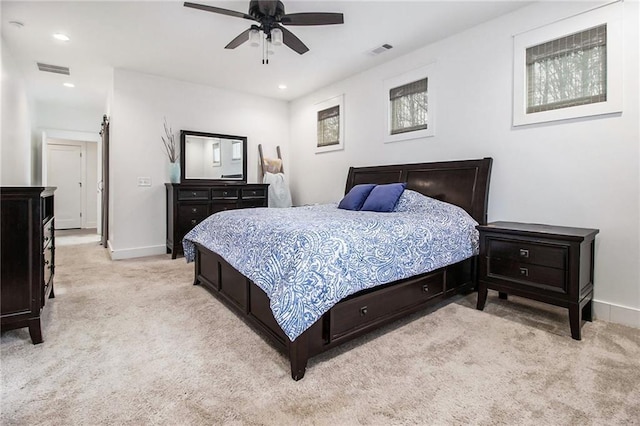 carpeted bedroom with ceiling fan