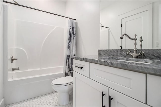 full bathroom with toilet, tile patterned floors, vanity, and shower / tub combo