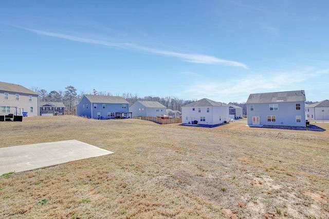 view of yard featuring a residential view