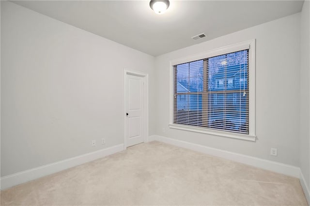 view of carpeted spare room