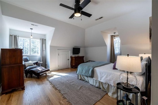 bedroom featuring wood-type flooring and ceiling fan