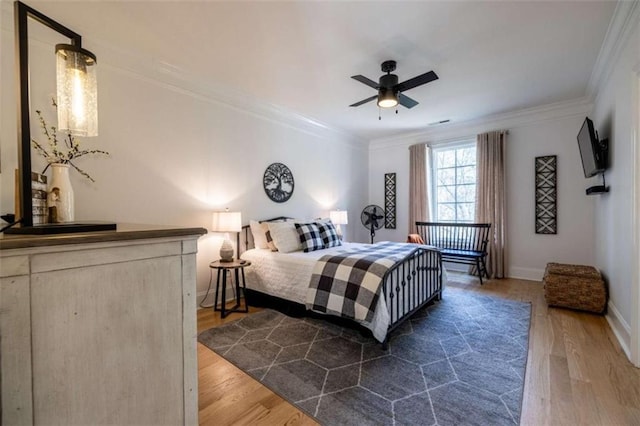 2938 Old Dalton Rd, Rome, GA 30165 - bedroom with a ceiling fan, baseboards, crown molding, and dark wood-type flooring