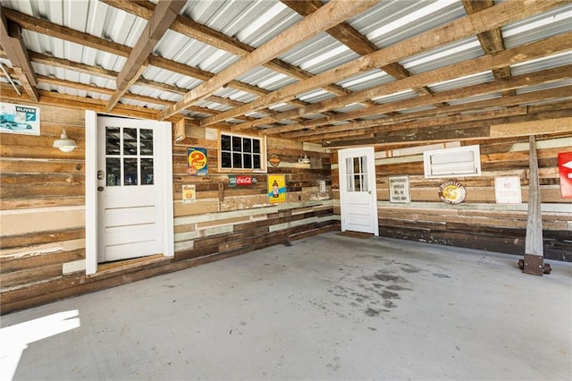 interior space featuring wood walls