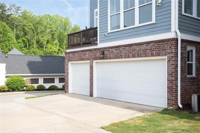 garage featuring driveway