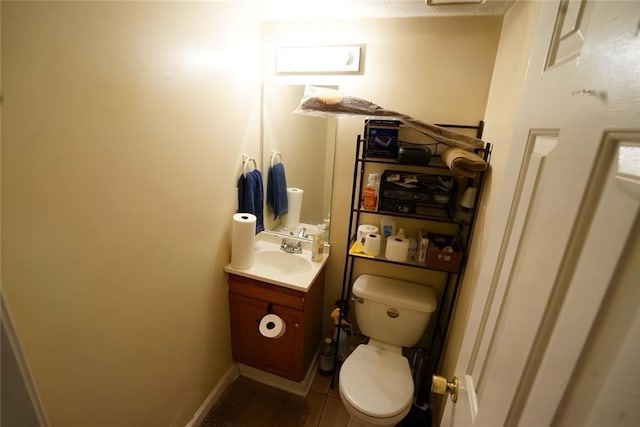 2726 Evans Mill Dr, Lithonia, GA 30058 - half bath with toilet, vanity, and tile patterned flooring