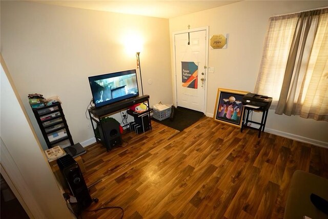 2726 Evans Mill Dr, Lithonia, GA 30058 - living room featuring wood finished floors and baseboards