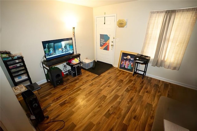 2726 Evans Mill Dr, Lithonia, GA 30058 - living room featuring wood finished floors and baseboards