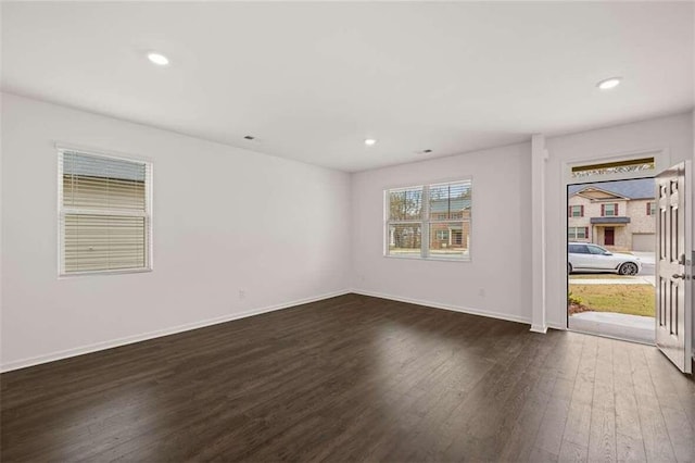 empty room featuring dark hardwood / wood-style floors