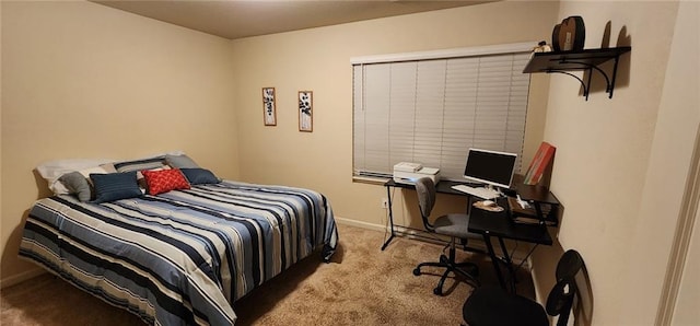 bedroom featuring light colored carpet