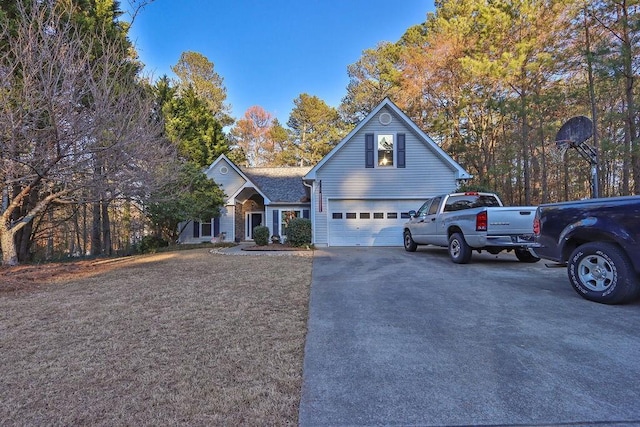 traditional-style house featuring driveway and a garage