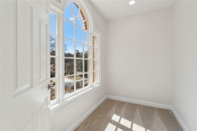 unfurnished room with recessed lighting, baseboards, and carpet floors